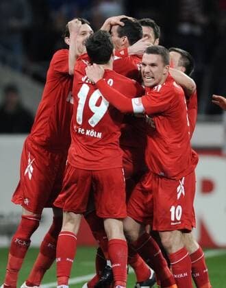 11-03-2011, Fussball, 1. Bundesliga, Saison 2010-2011, 26. Spieltag, - 1. FC Köln - Hannover 96 4-0 Jubel Köln nach dem 1-0, v.li. Milivoje Novakovic (1.FC Köln), Mato Jajalo (1. FC Köln), Petit (1.FC Köln), Lukas Podolski (1.FC Köln)