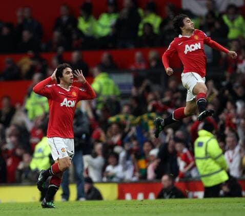 Manchester Uniteds Fabio da Silva (left) celebrates scoring his sides opening with his brother Rafael da Silva EON FA Cup 6th Round Manchester United (ManU red) vs. Arsenal FC London (yellow) 2:0 EDITORIAL USE ONLY. No use with unauthorised audio, video, data, fixture lists, club league logos or live services. Online in-match use limited to 120 images, no video emulation. No use in betting, games or single club league player publications. o0 Tor