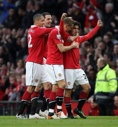 Manchester Uniteds Fabio da Silva (R) celebrates scoring his sides opening goal with L-R Chris Smalling, John O Shea and Nemanja Vidic EON FA Cup 6th Round Manchester United (ManU red) vs. Arsenal FC London (yellow) 2:0 EDITORIAL USE ONLY. No use with unauthorised audio, video, data, fixture lists, club league logos or live services. Online in-match use limited to 120 images, no video emulation. No use in betting, games or single club league player publications. o0 Jubel, Freude