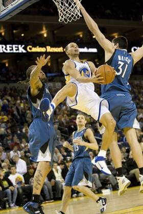 Mar. 13, 2011 - Oakland, California, U.S. - Golden State Warriors guard STEPHEN CURRY 30 in action against the Minnesota Timberwolves. - ZUMAwm1