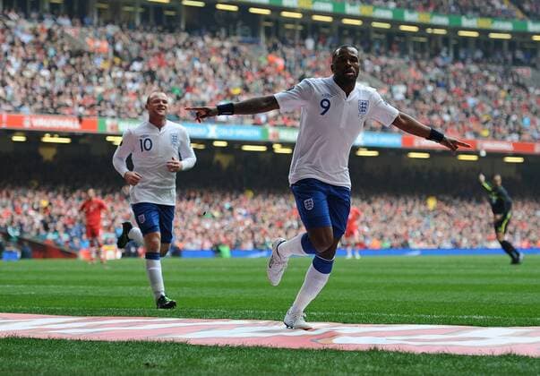 Wales vs. England --- England s Darren Bent (R) and Wayn Rooney celebrate scoring their second goal  o0 Freude