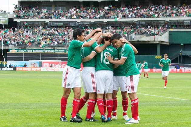 Mar. 26, 2011 - Oakland, California, U.S - Mexico players celebrate their first goal during the FIFA friendly match between Mexico and Paraguay at Oakland-Alameda County Coliseum in Oakland, CA. Mexico beat Paraguay 3-1. - ZUMAq48
