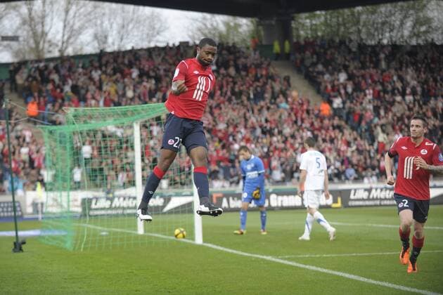 Lille OSC (rot) vs. SM Caen (weiß) --- AURELIEN CHEDJOU (li.)  JBAutissier o0 Jubel Freude