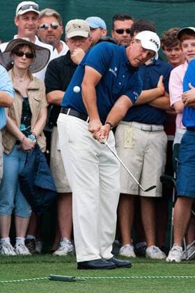 Humble, Texas, Phil Mickelson (USA) putts the ball for a birdie in hole-1 to start the final round of the Shell Houston Open. - ZUMAq99