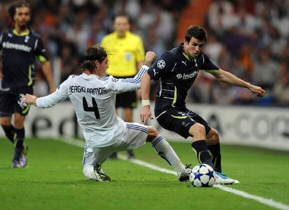 Real CF Madrid (white) - Tottenham Hotspur (black), Sergio Ramos of Real Madrid tackles Tottenham s Gareth Bale 