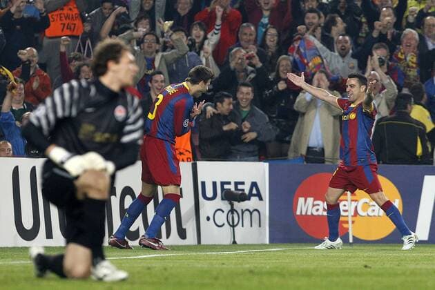 FC Barcelona s Gerard Pique (l) and Xavi Hernandez celebrates goal - UEFA Champions League - FC Barcelona (Barca) - Shakhtar Donetsk -  (20120564)