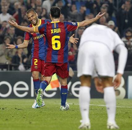 FC Barcelona s Daniel Alves (l) and Xavi Hernandez celebrates goal - UEFA Champions League - FC Barcelona (Barca) - Shakhtar Donetsk -  (20120569)