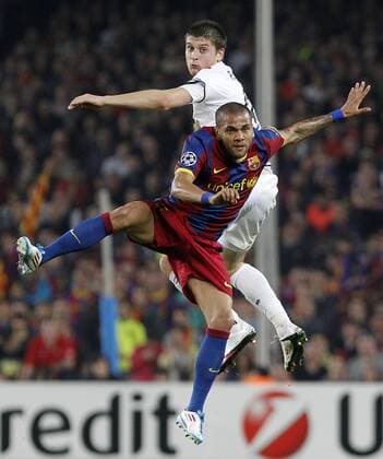 FC Barcelona s Daniel Alves (front) and FC Shakhtar Donetsk s Yaroslav Rakitskiy - UEFA Champions League - FC Barcelona (Barca) - Shakhtar Donetsk -  (20120560)