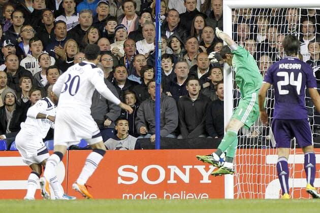 Football - Champions League Quarter Final Second Leg - Tottenham Hotspur (white) vs Real Madrid (blue) --- Real Madrid s Goalkeeper Iker Casillas makes a save with his feet after a shot Tottenham Hotspur s Jermain Defoe at White Hart Lane 