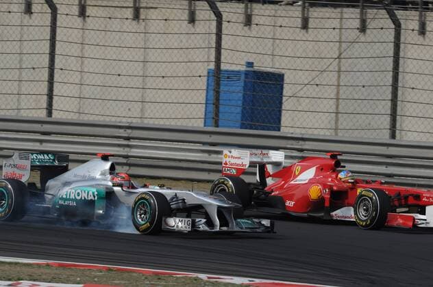 Formel 1: Grand Prix von China, 17.04.2011; MICHAEL SCHUMACHER (GER, L) - MERCEDES MGP GP W02 - FERNANDO ALONSO (ESP) - FERRARI F150 - xGillesLeventx - 