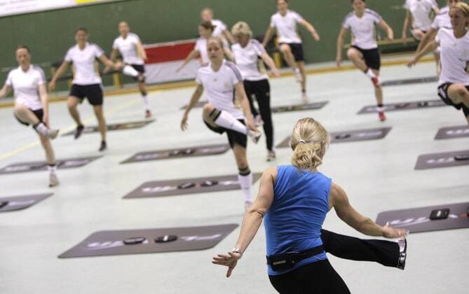 Fitness Instructor gives instructions during the athletic- and coordinationtraining of the german women national team, Rot-Weiss-Essen in Koeln on April 20., 2011. Mika