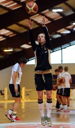 COLOGNE, GERMANY - APRIL 21: Simone Laudehr throws the ball during a Basketball training session at the German Women National Team training camp at Ballpark Koeln on April 21, 2011 in Cologne, Germany. Simone Laudehr o0 DFB