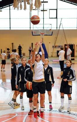 COLOGNE, GERMANY - APRIL 21: Ariane Hingst throws the ball during a Basketball training session at the German Women National Team training camp at Ballpark Köln on April 21, 2011 in Cologne, Germany. Ariane Hingst o0 DFB