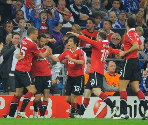 Ryan Giggs (2L) of Manchester United celebrates scoring with L-R: Nemanja Vidic, Ji Sung Park and Wayne Rooney - Champions League SemiFinal 1st leg - FC Schalke 04 (blue) vs Manchester United (ManU) - EDITORIAL USE ONLY. No use with unauthorised audio, video, data, fixture lists, club league logos or live services. Online in-match use limited to 120 images, no video emulation. No use in betting, games or single club league player publications.