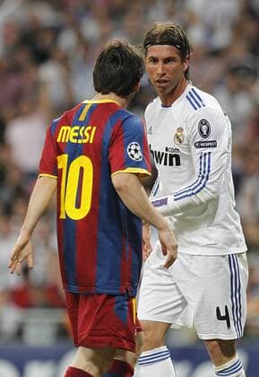 Real Madrid s Sergio Ramos and FC Barcelona s Lionel Messi (L) during Champions League semifinal first match on April 27 2011 -  (062) o0 Barca