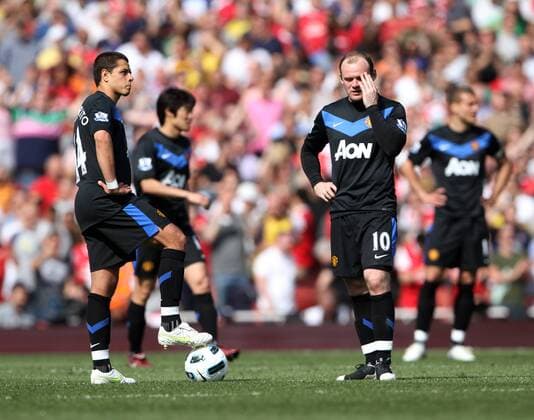 Manchester Uniteds Wayne Rooney looks on dejected after going 1-0 down Barclays Premier League Arsenal FC (red) v Manchester United (black) 1st May, 2011 EDITORIAL USE ONLY. No use with unauthorised audio, video, data, fixture lists, club league logos or live services. Online in-match use limited to 120 images, no video emulation. No use in betting, games or single club league player publications. o0 Manu