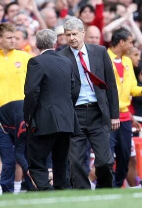 Arsenals coach Arsene Wenger (R) shakes hands with Manchester Uniteds coach Sir Alex Ferguson at the final whislte Barclays Premier League, London, Arsenal FC (red) v Manchester United (black) 1st May, 2011 EDITORIAL USE ONLY. No use with unauthorised audio, video, data, fixture lists, club league logos or live services. Online in-match use limited to 120 images, no video emulation. No use in betting, games or single club league player publications. o0 Manu