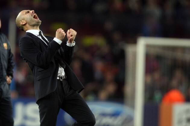 FC Barcelona (Barca red blue) - Real CF Madrid (white), Barcelonas Coach Josep Pep Guardiola celebrates after the UEFA Champions League semi-finals soccer match. May, 3, 2011.  o0 Jubel, Freude