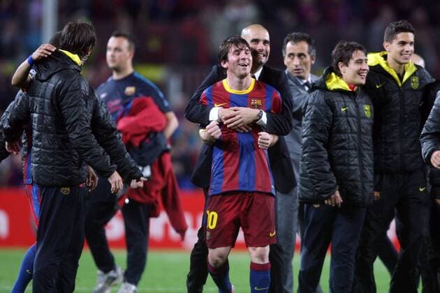 FC Barcelona (Barca red blue) - Real CF Madrid (white), Barcelonas Coach Josep Pep Guardiola hugs Lionel Messi after the UEFA Champions League semi-finals soccer match. May, 3, 2011.  o0 Jubel, Freude