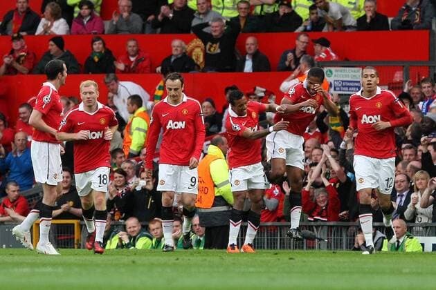 Champions League SemiFinal 2nd Leg - Manchester United (ManU) - FC Schalke 04 - Antonio Valencia of Manchester United (2R) celebrates his opening goal at Old Trafford 