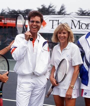 Sue Barker and Singer Cliff Richard playing tennis together in an Exhibition match. 23 07 1991 Nottingham Federation Cup 1991  o0 people Kunst Musik