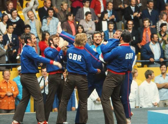 Dave Starbrook (GBR) is lifted off the ground by team mates after winning the Silver Medal in the 93kg. David Jacks with his back to camera.Mens Judo Munich Olympics 1972 