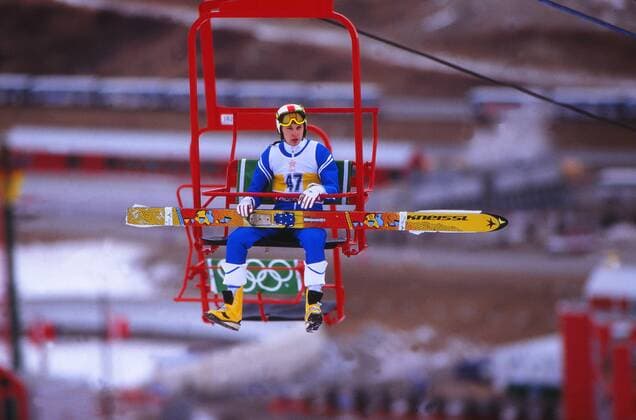 Matti Nykänen (Finland) on the ski lift chair . Winter Olympics Calgary, 1988. 15 02 88  o0 Ski Skisport Nordisch Skispringen