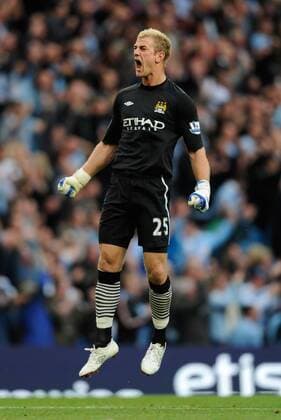 Joe Hart of Manchester City celebrates the first goal - Barclays Premier League Manchester City (blue) v Tottenham Hotspur (white) 10th May, 2011 EDITORIAL USE ONLY. No use with unauthorised audio, video, data, fixture lists, club league logos or live services. Online in-match use limited to 120 images, no video emulation. No use in betting, games or single club league player publications.