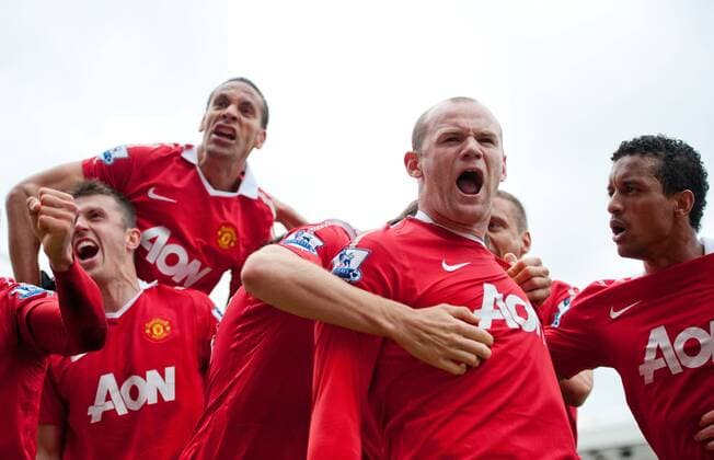 Wayne Rooney of Manchester United (2R) celebrates scoring the equalising goal - Premier League - Blackburn Rovers - Manchester United (ManU) - EDITORIAL USE ONLY. No use with unauthorised audio, video, data, fixture lists, club league logos or live services. Online in-match use limited to 120 images, no video emulation. No use in betting, games or single club league player publications.