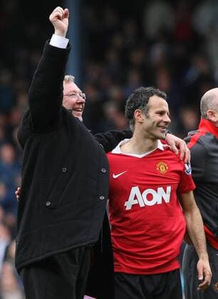 Premier League - Blackburn - Manchester United (ManU) - Alex Ferguson (L), coach of Manchester United and Ryan Giggs of Manchester United celebrate securing their sides 19th title at Ewood Park 