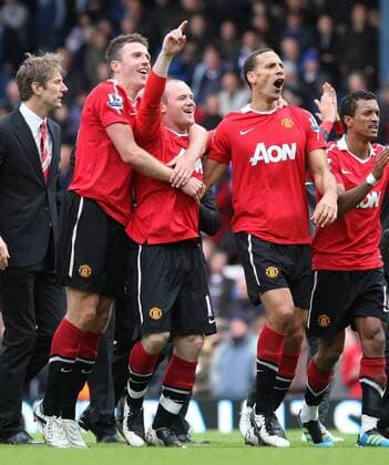 Premier League - Blackburn - Manchester United (ManU) - L-R - Goalie Edwin van der Sar, Michael Carrick, Wayne Rooney, Rio Ferdinand and Nani celebrate securing their sides 19th title at Ewood Park 