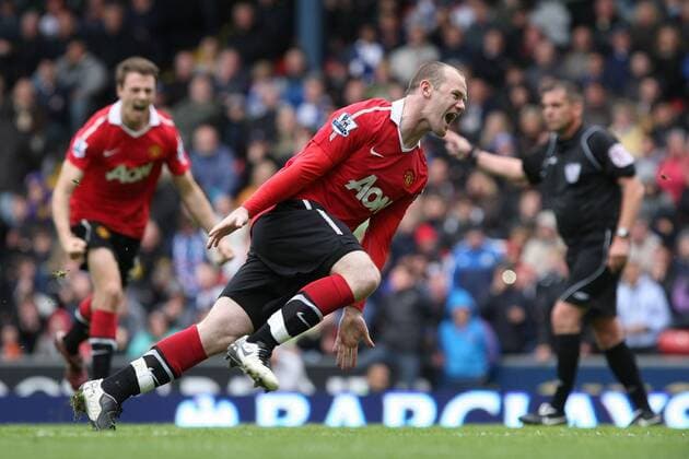 Premier League - Blackburn Rovers - Manchester United (ManU) - Wayne Rooney of Manchester United (front) celebrates scoring from the penalty spot at Ewood Park 