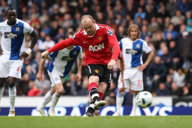 Premier League - Blackburn Rovers - Manchester United (ManU) - Wayne Rooney of Manchester United strikes from the penalty spot to level the scores at Ewood Park 
