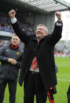 Sir Alex Ferguson coach of Manchester United punches the air - Premier League Champion Manchester United (ManU) 2011 in Blackburn - EDITORIAL USE ONLY. No use with unauthorised audio, video, data, fixture lists, club league logos or live services. Online in-match use limited to 120 images, no video emulation. No use in betting, games or single club league player publications.