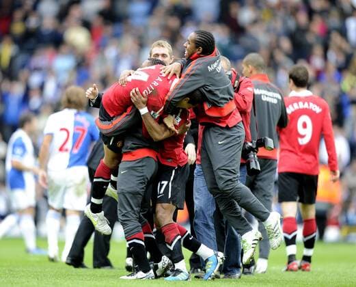 Manchester United players celebrate winning the Premier League trophy for the 19th time - Premier League Champion Manchester United (ManU) 2011 in Blackburn - EDITORIAL USE ONLY. No use with unauthorised audio, video, data, fixture lists, club league logos or live services. Online in-match use limited to 120 images, no video emulation. No use in betting, games or single club league player publications.