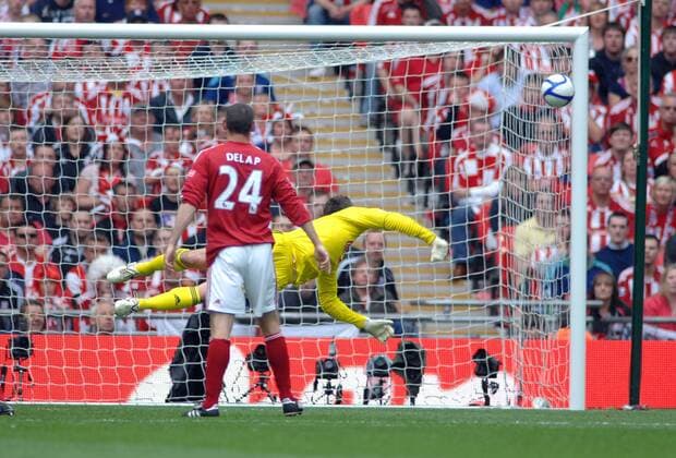 FA cup Final - Manchester City (blue) vs Stoke City (red white) - Thomas Sorensen (Stoke) tips a shot around the post.14 05 2011 