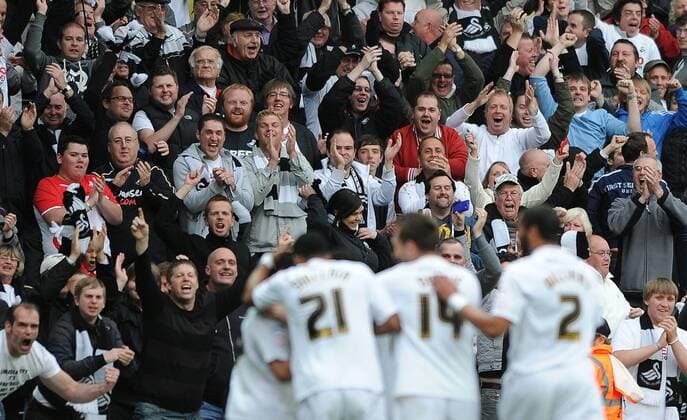 Championship Playoff SemiFinal - Swansea City - Leon Britton of Swansea City celebrates in front of the home fans after scoring the opening goal at the Liberty Stadium, Swansea 