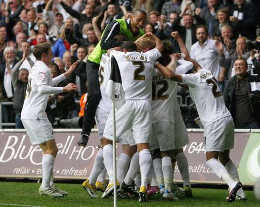 Stephen Dobbie of Swansea City celebrates scoring his side s second goal during the Championship playoff 2nd leg Swansea City - Nottingham Forest 3:1 - EDITORIAL USE ONLY. No use with unauthorised audio, video, data, fixture lists, club league logos or live services. Online in-match use limited to 120 images, no video emulation. No use in betting, games or single club league player publications.