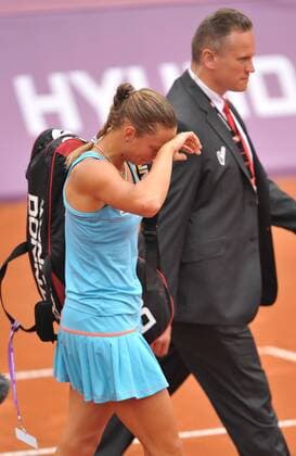 Yanina Wickmayer of Belgium leaves the pitch after suffering an injury during the women s singles quarter-final match at WTA Tennis Damen Brussels Open tennis tournament in Brussels --- 
