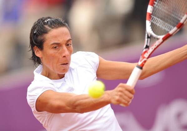 Francesca Schiavone from Italy plays a return during the women s singles quarterfinal match at WTA Tennis Damen Brussels Open tennis tournament in Brussels, Belgium, on May 19, 2011. 
