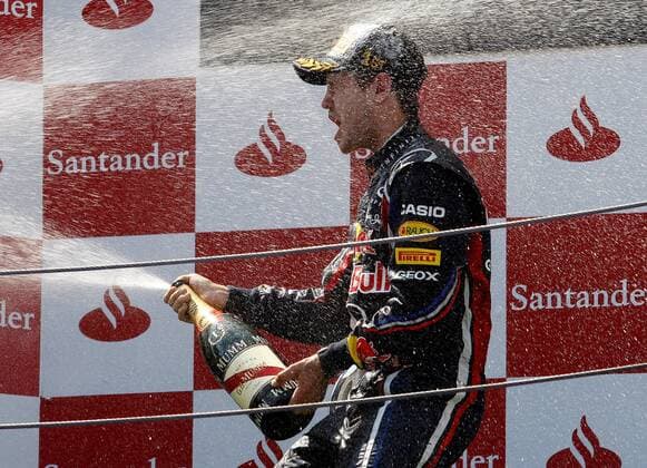 FORMEL 1 - GP von Spanien BARCELONA,SPANIEN,22.MAI.11 - MOTORSPORT, FORMEL 1 - Grand Prix von Spanien, Siegerehrung. Bild zeigt Sebastian Vettel (GER Red Bull Racing). Keywords: Sektdusche. 