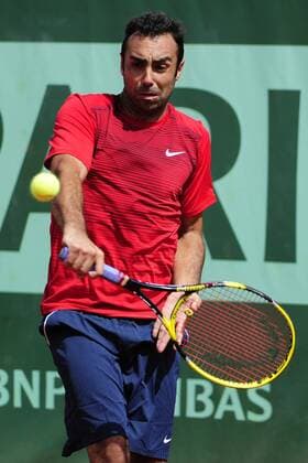 24.05.2011 French Open Tennis from Roland Garros Paris: Eric Prodon of France returns a shot on day three of the French Open tennis championships. xEstherxLimx  ActionPlus11173638 Content restricted for UK based newspaper