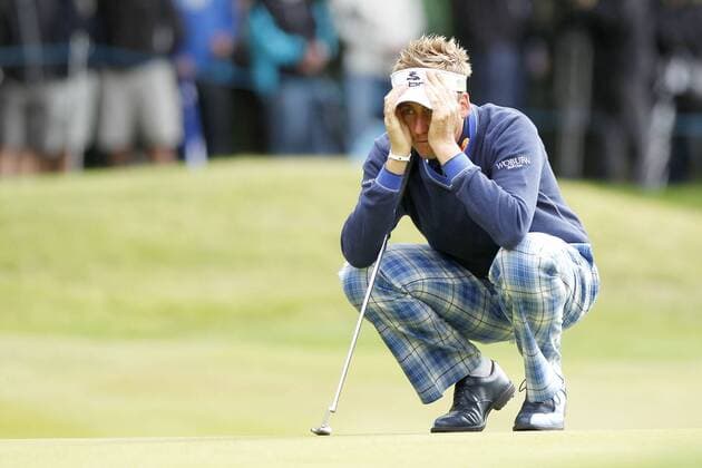 Golf - BMW PGA Golf Herren Championship Englands Ian Poulter eyes up a putt on the first green at Wentworth Club, Surrey 