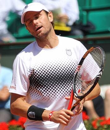 American Mardy Fish reacts after a shot during his French Open mens third round match at Roland Garros in Paris on May 28, 2011. Simon defeated Fish 6-3, 6-4, 6-2 to advance to the fourth round.  PAR20110528744