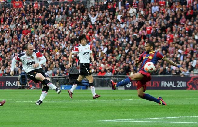 Manchester Uniteds Wayne Rooney scoring his sides opening goal UEFA Champions League Final Manchester United v Barcelona 28th May, 2011 EDITORIAL USE ONLY. No use with unauthorised audio, video, data, fixture lists, club league logos or live services. Online in-match use limited to 120 images, no video emulation. No use in betting, games or single club league player publications.
