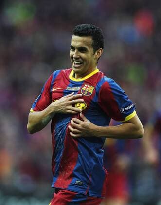 Pedro Rodriguez of Barcelona Celebrates scoring UEFA Champions League - Manchester United 28th May, 2011 EDITORIAL USE ONLY. No use with unauthorised audio, video, data, fixture lists, club league logos or live services. Online in-match use limited to 120 images, no video emulation. No use in betting, games or single club league player publications.