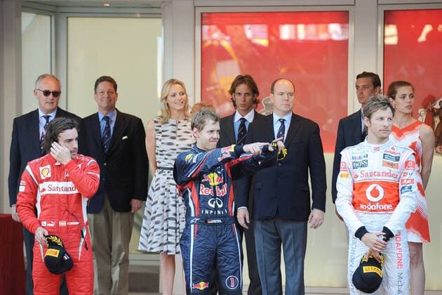 MONACO FORMULA ONE GRAND PRIX . PODIUM CEREMONY FOR DRIVERS FERNANDO ALONSO (Ferrari) ,WINNER SEBASTIAN VETTEL (Red Bull) AND JENSON BUTTON (McLaren Mercedes),WITH PRINCE ALBERT II OF MONACO ,FIANCEE CHARLENE WITTSTOCK AND NIECE CHARLOTTE CASIRAGHI (RIGHT) - F1 MONACO - COURSE - GRAND PRIX 2011 xBERNARDSt EtienneTx  o0 Sieg Siegerehrung Adel people