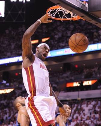 (110603) -- MIAMI, June 3, 2011 (Xinhua) -- LeBron James of the Miami Heat slam dunks during the Game Two of the 2011 NBA Basketball Herren USA Finals against the Dallas Mavericks at American Airlines Arena in Miami, Florida, the United States, on June 2, 2011. (Xinhua Zhang Jun) (xm) US-MIAMI-BASKETBALL-NBA FINALS-GAME 2 
