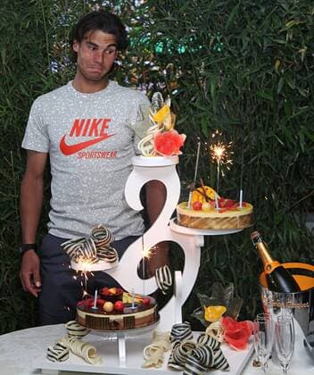 Rafael Nadal (ESP) receives a birthday cake on his 25th birthday after winning his French Open mens semifinal match at Roland Garros in Paris on June 3, 2011.  PAR20110603742
