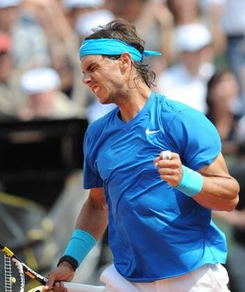 (110605) -- PARIS, June 5, 2011 -- Rafael Nadal of Spain reacts during the men s final in the French Open tennis championship at the Roland Garros stadium in Paris June 5, 2011. 